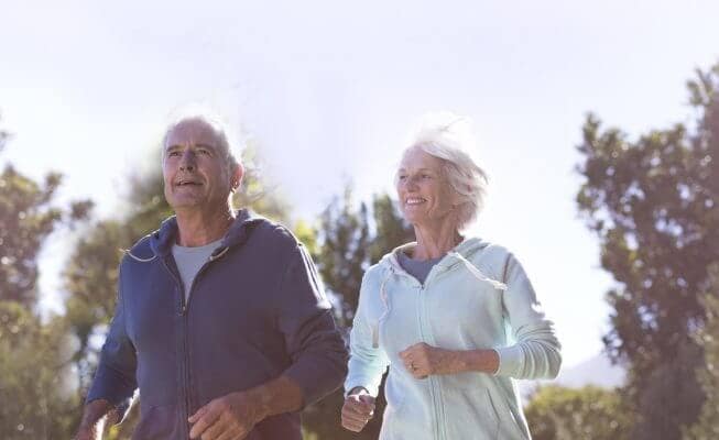 Retired couple take a job through their neighborhood.