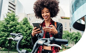 Woman adds Discover debit card to Google Pay app while on the go.