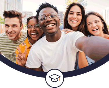 Five friends taking a selfie smiling together in the city.