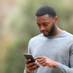 A person looking at smartphone device.