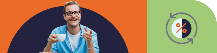 Man wearing glasses, drinking from a large mug and pointing