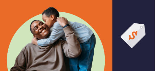 Young boy hugs his seated grandpa around the neck and kisses his cheek
