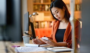 Woman reviewing her finances.