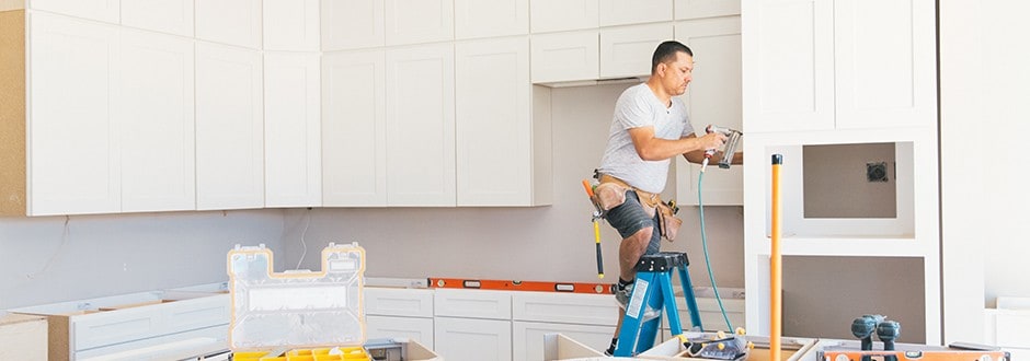 Contractor completing kitchen renovation that increases home equity