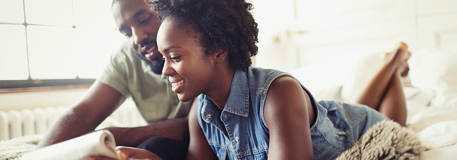 Couple researching home equity loan rates in California to refinance their HELOC