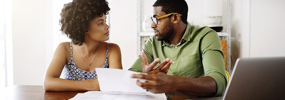 Home buyers discussing the house price index and what it means to them