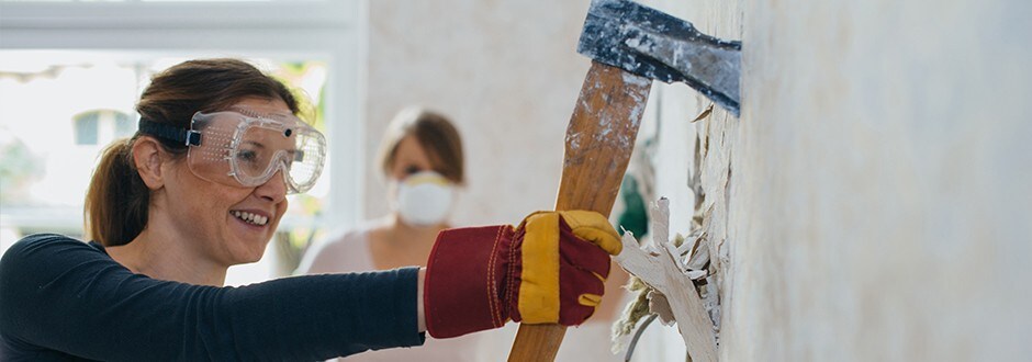 Woman begins a bathroom remodel project attempting to increase her home value