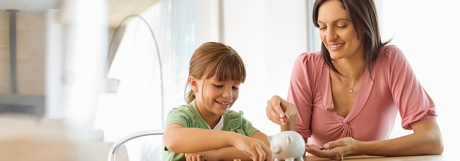 Mother teaching her daughter about saving up and eliminating debt