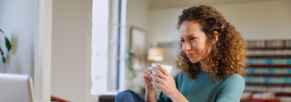 Woman at home researching if home equity loans are tax deductible.