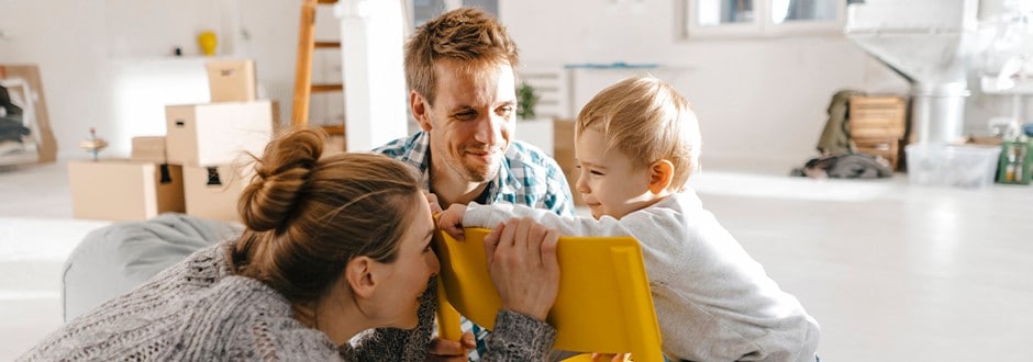 Couple with their toddler in the process of refinancing their house