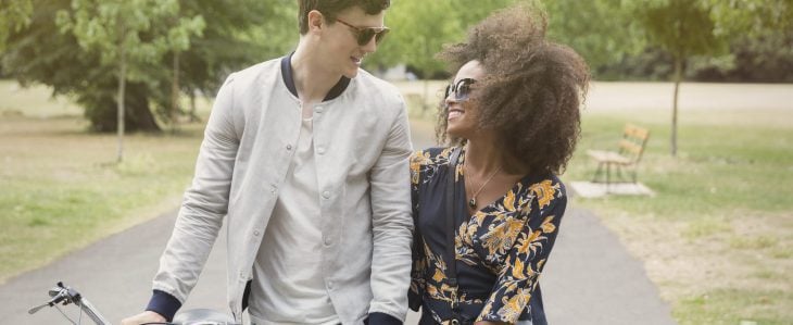 Young couple celebrates what to do with a raise from work