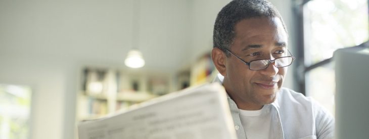 Man researching how interest rates affect retirement plans