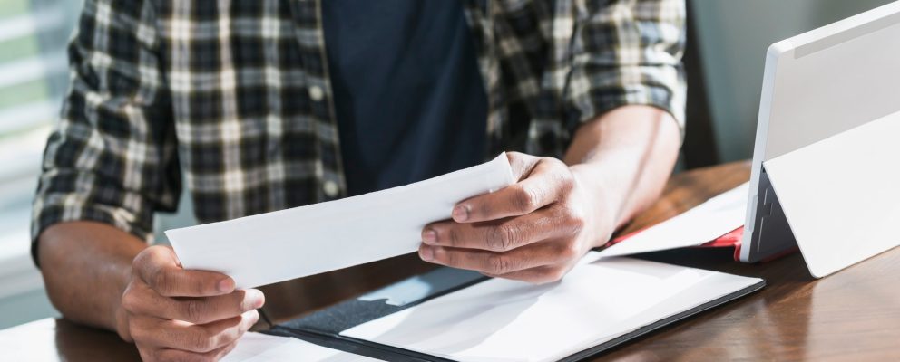 Man budgeting using the envelope method