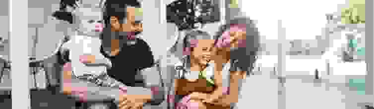 Young family sitting out on their front porch