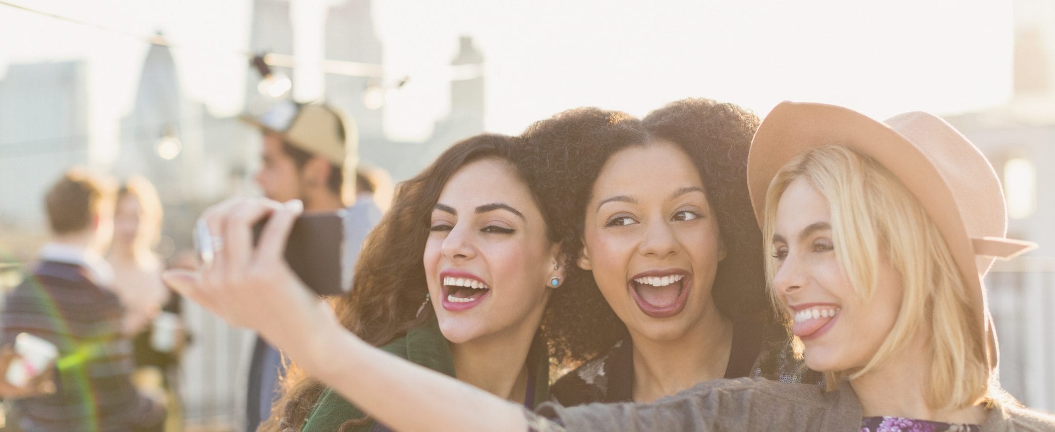 Three friends taking a selfie.