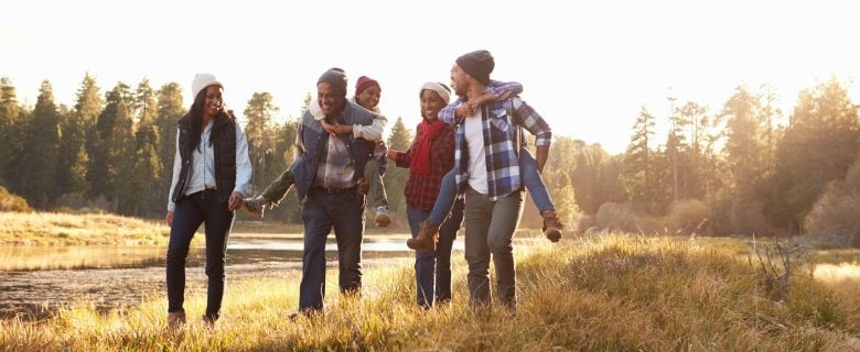 Two families enjoying a hike together.