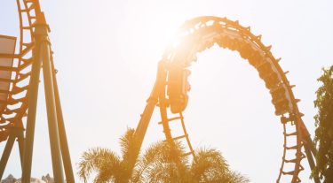 Close-up of a looping roller coaster.