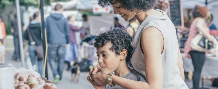 When you want to have fun without spending, look for ways to be a tourist in your own hometown, like going to a farmers market.