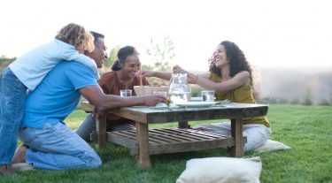 These money strategies for the sandwich generation can help you budget for raising kids and caring for aging parents