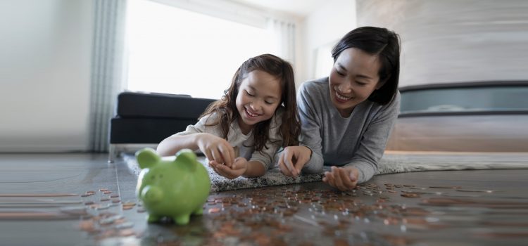 Mother and daughter counting change